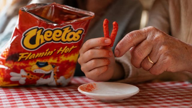 Two generations of hands in one bag